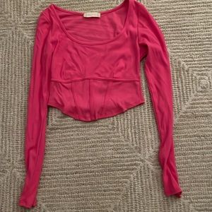 Pink Long sleeve cropped shirt.